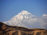 Mustang 02 02-2 Dhaulagiri Close Up From Pass After Tange After four hours from Tange we reached the 4050m pass with a view of the trail contouring into the distance with Dhaulagiri poking its summit above the ridge.